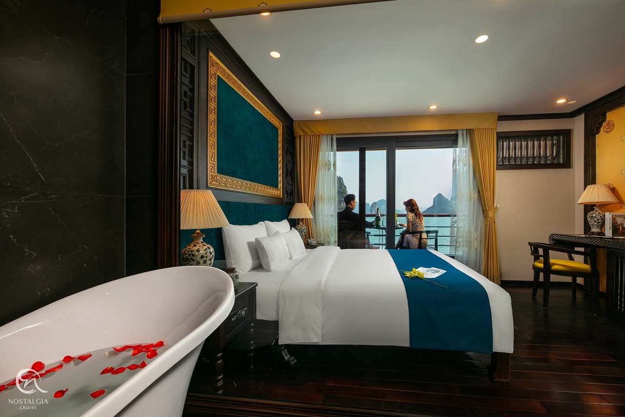 Elegant cruise balcony view of Halong Bay with stunning seascape and misty islands. Perfect for a ro.