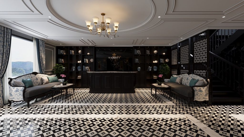 Luxurious cruise lounge interior with elegant decor and panoramic views of Lan Ha Bay.