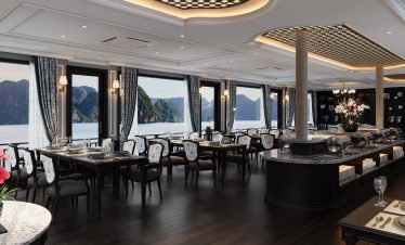 Luxurious cruise dining room with panoramic views of Lan Ha Bay, perfect for a relaxing voyage.
