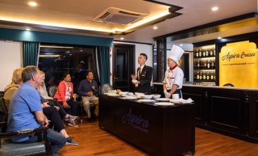 Elegant cruise dinner experience on Aspire Cruises in Lan Ha Bay, Vietnam.
