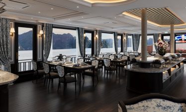 Luxurious cruise interior with panoramic views of Lan Ha Bay, perfect for a relaxing vacation.