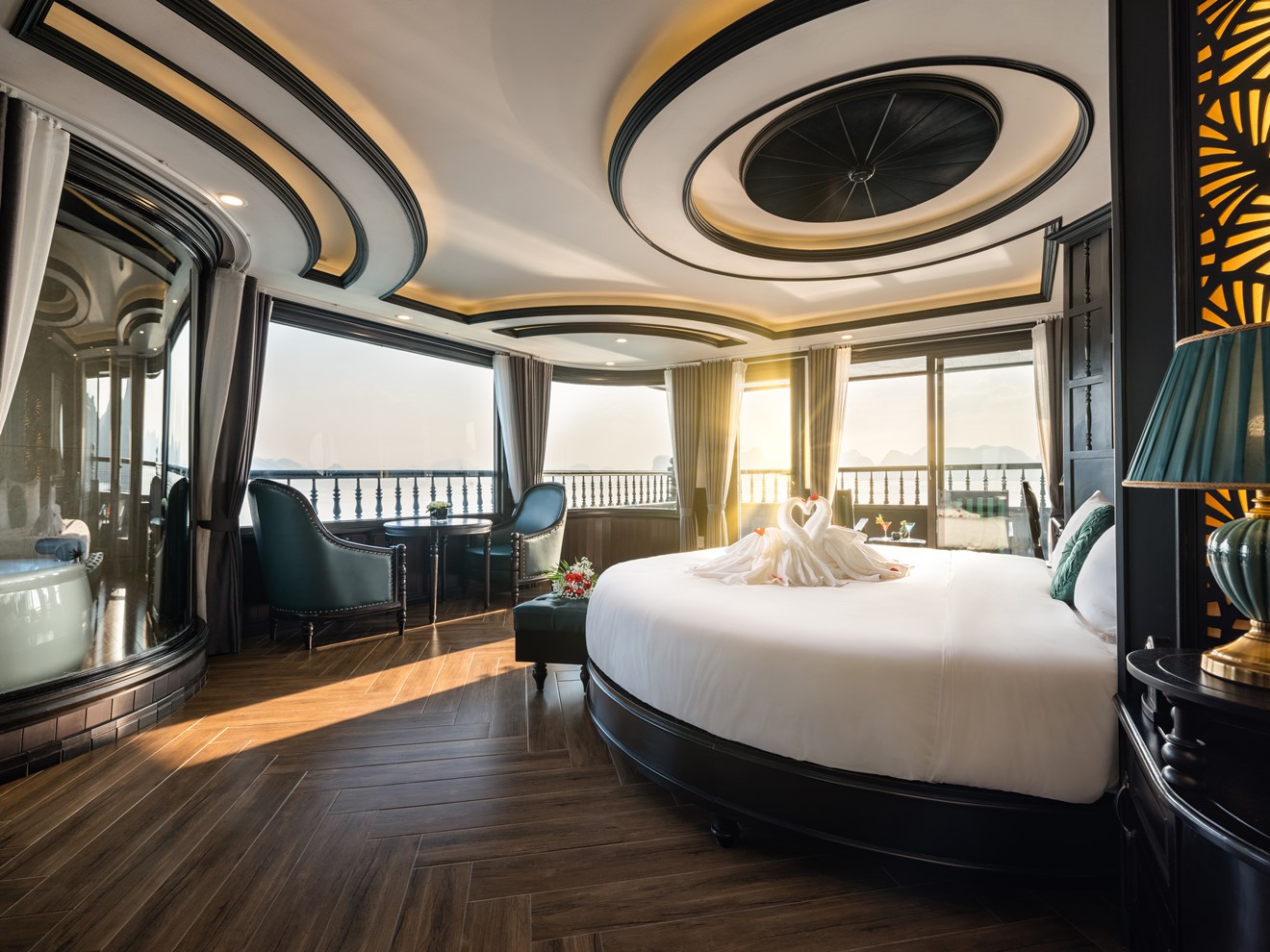 Luxurious cruise balcony with panoramic views of Halong Bay, perfect for a romantic getaway.