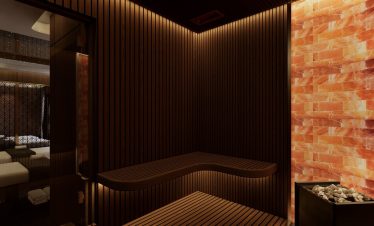 Relaxing cruise lounge with warm lighting and modern decor in Halong Bay.