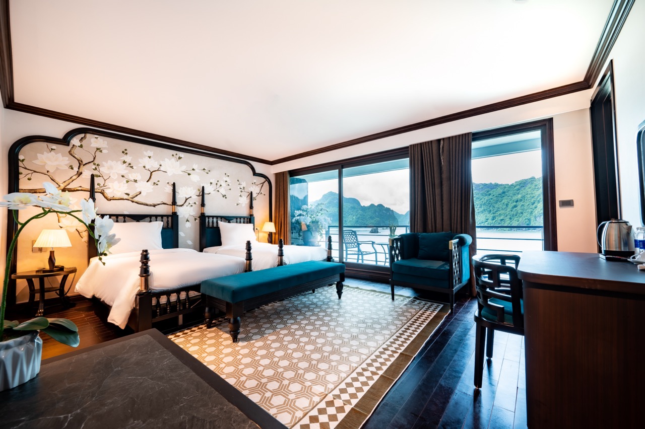 Stunning view from a cruise balcony in Halong Bay, showcasing tranquil waters and lush islands, perf.