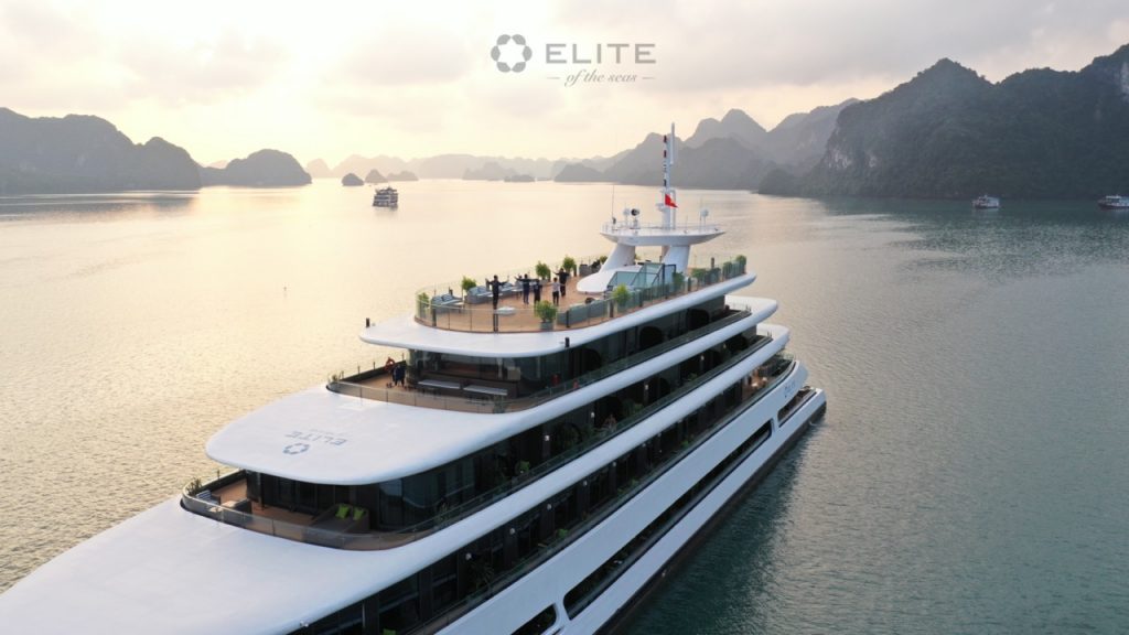 Elegant cruise ship on Halong Bay with scenic mountain views, perfect for a relaxing 2-day, 1-night.