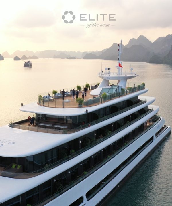 Elegant cruise ship on Halong Bay with scenic mountain views, perfect for a relaxing 2-day, 1-night.