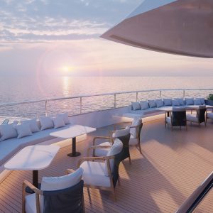 Luxurious yacht deck with ocean sunset, modern seating, panoramic sea views, perfect for relaxing or events.