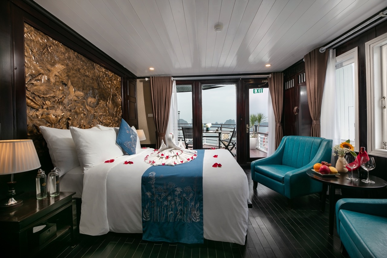 Elegant cruise balcony scene showcasing comfort and scenic beauty in Halong Bay.