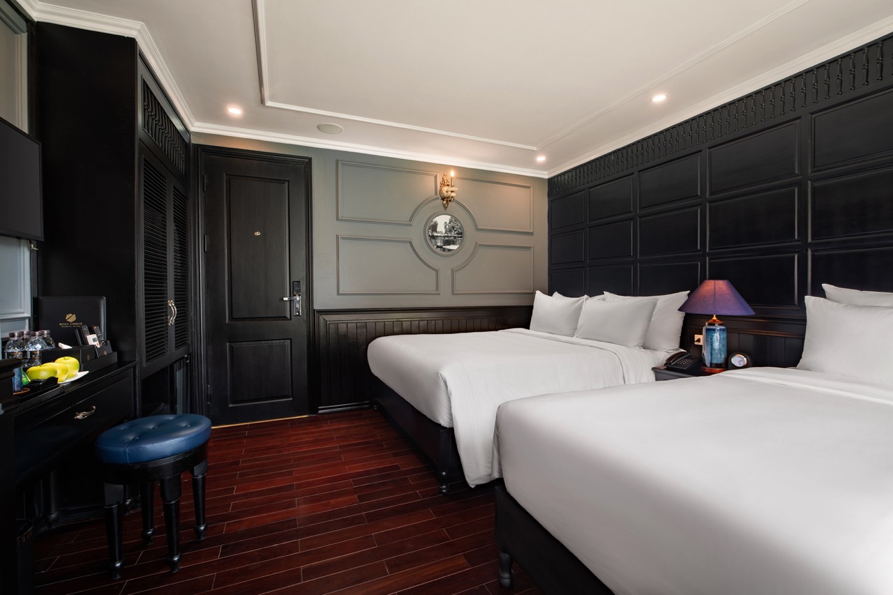 Elegant cruise balcony view of Halong Bay with modern amenities and serene atmosphere.