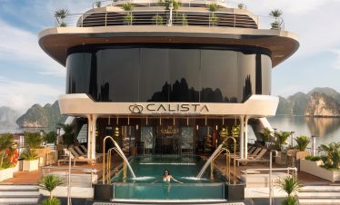 Luxury Halong Bay cruise balcony with scenic views and relaxing atmosphere.