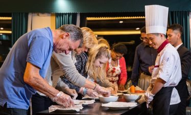 Delicious international buffet with diverse dishes and attentive staff at ViettrendTour.