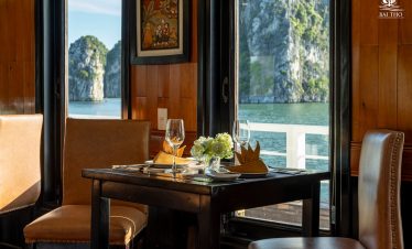 Stunning view of limestone karsts from a cruise balcony in Halong Bay, perfect for relaxing and sigh.