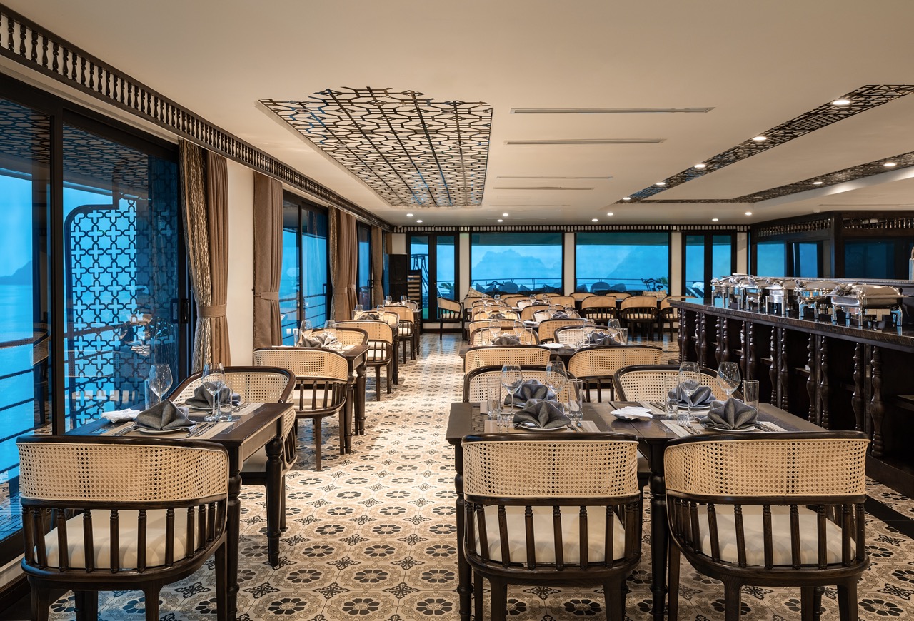 Elegant cruise dining room with ocean views on Venus Cruise Lan Ha Bay, perfect for a relaxing trave.