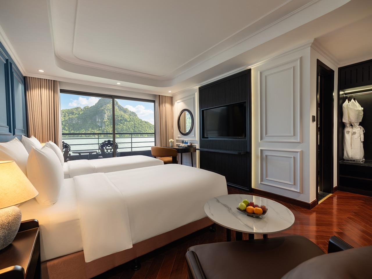 Stunning view of Lan Ha Bay from a cruise balcony with elegant interior, perfect for a relaxing geta.