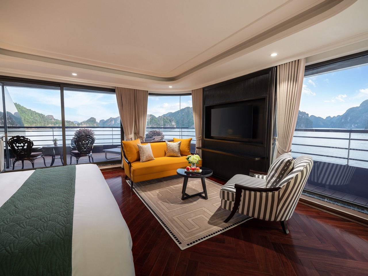 Luxurious Lan Ha Bay cruise balcony with stunning sea views and elegant interior design.