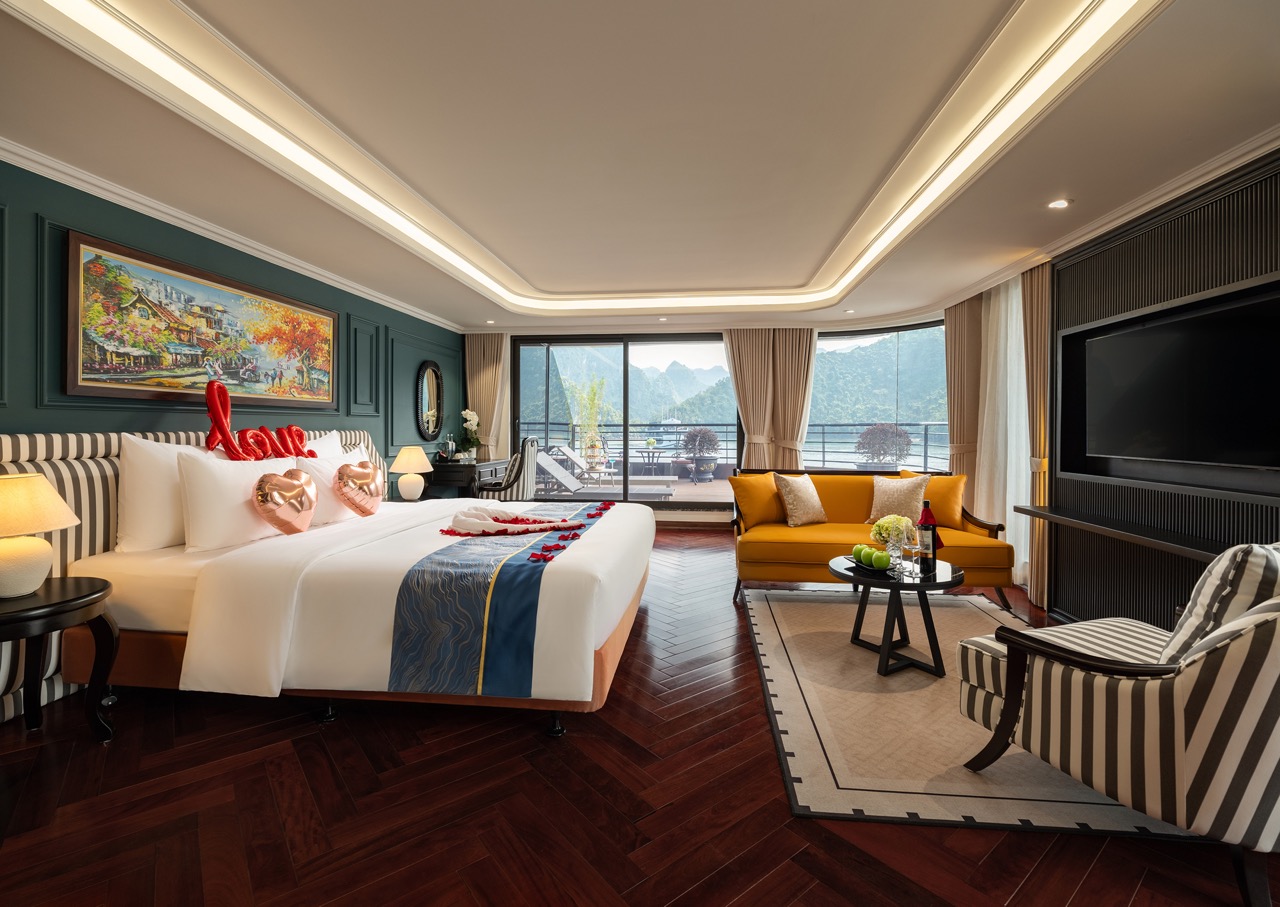 Elegant cruise balcony view of Lan Ha Bay with scenic mountain backdrop, perfect for relaxing and si.