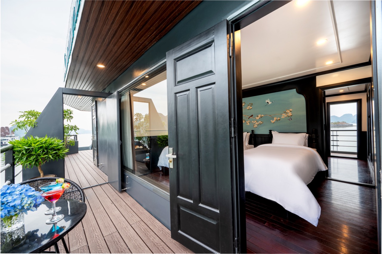 Stunning Lan Ha Bay cruise balcony with modern interior, scenic views, perfect for relaxing and enjo.