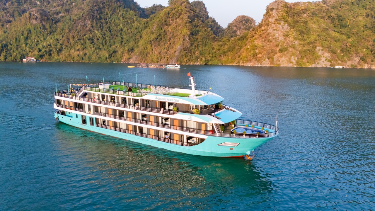 Luxury cruise balcony view in Lan Ha Bay, Vietnam, perfect for relaxing and exploring scenic islands.